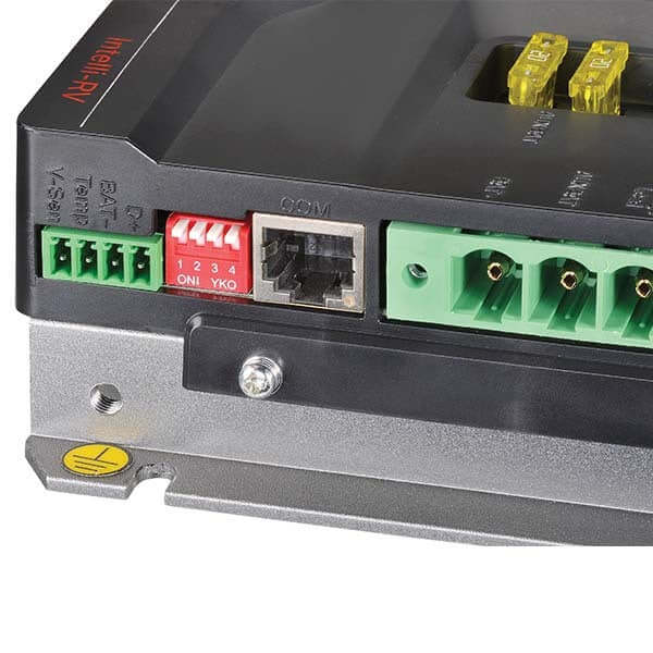 Close-up of a electronic device with connectors and labels on a white background