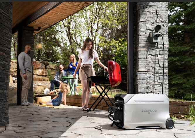 EcoFlow power station on a patio with people in the background