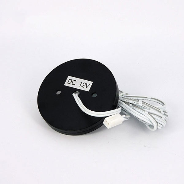 A black circular LED ceiling down light with DC 12V label on a white background