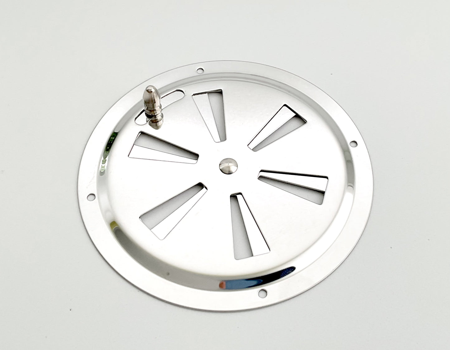 A round stainless steel metal vent with a butterfly louvered design.