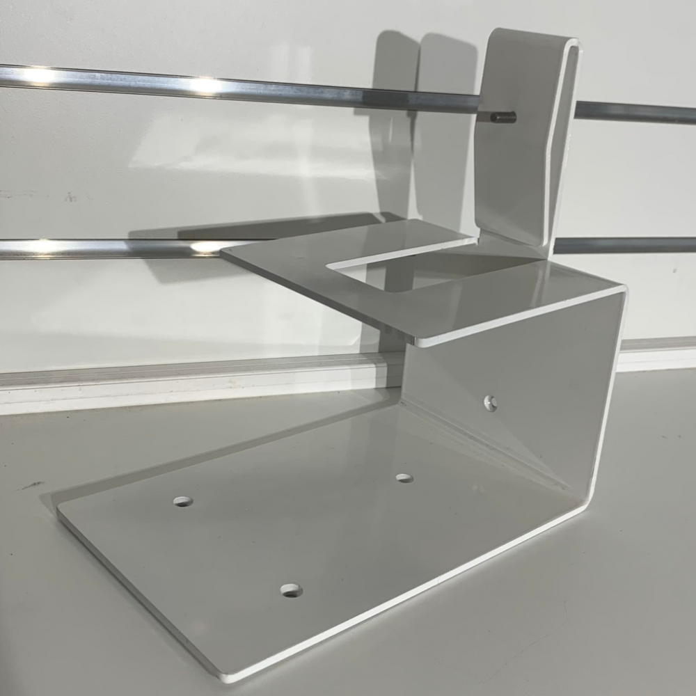 White toilet bracket designed for 10L portable toilets, ideal for campervan conversions.