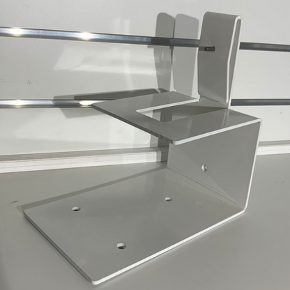 White toilet bracket designed for 10L portable toilets, ideal for campervan conversions.