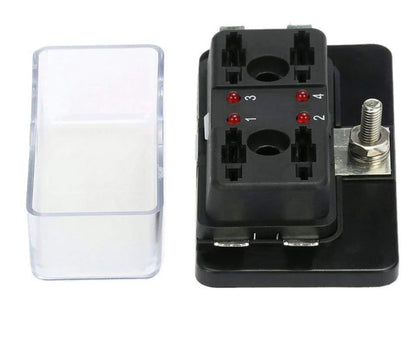 Black electrical component with connectors and a clear plastic cover on a white background
