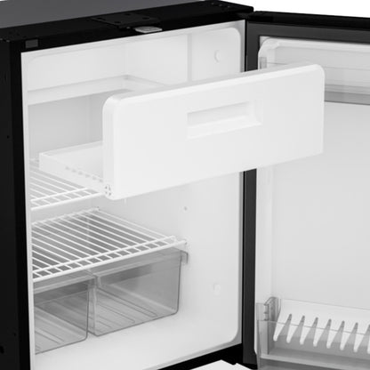 Interior view of the Dometic NRX 50C fridge/freezer with shelves and drawers for organized storage.