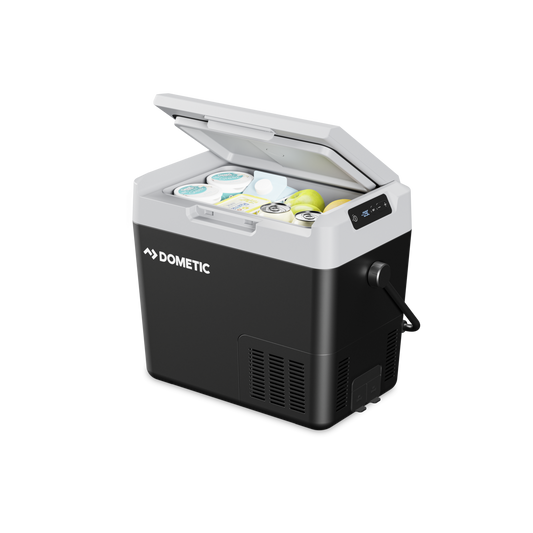 Dometic portable cooler with open lid showing ice and items on a white background