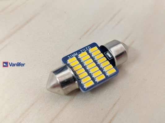 Car LED bulb branding on a light wooden surface