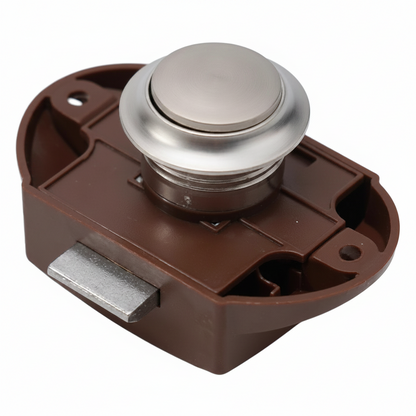 Angled view of chrome push button cabinet latch showing secure locking mechanism for campervan cabinetry