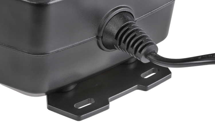 Black power adapter with a plug on a white background