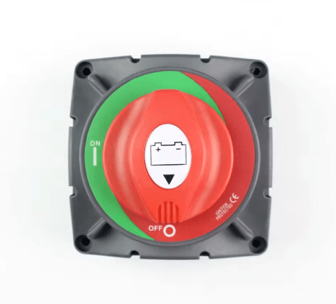 Red and green switch with a white label on a white background


