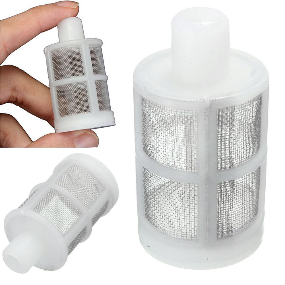 White cylindrical filter with metal mesh held by a hand on a white background