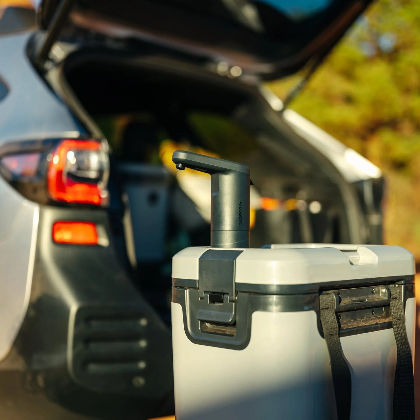 Dometic Recon 360 faucet by the back of a car.