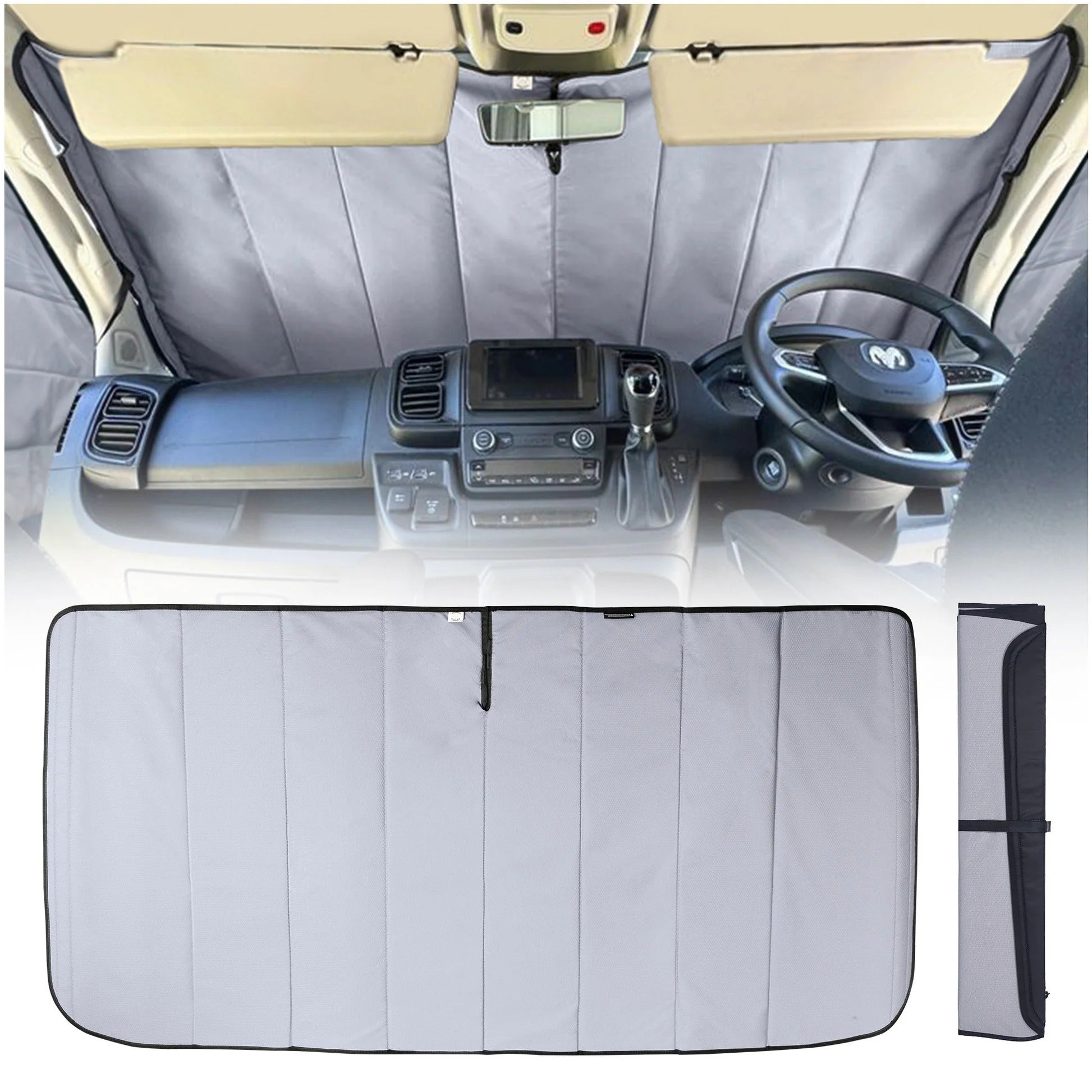 Car interior with a sunshade covering the windshield, dashboard, and steering wheel.