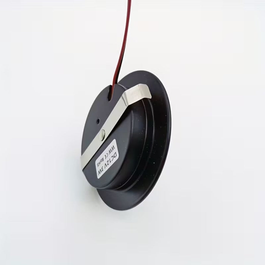 Black led light showing wire and backside of light