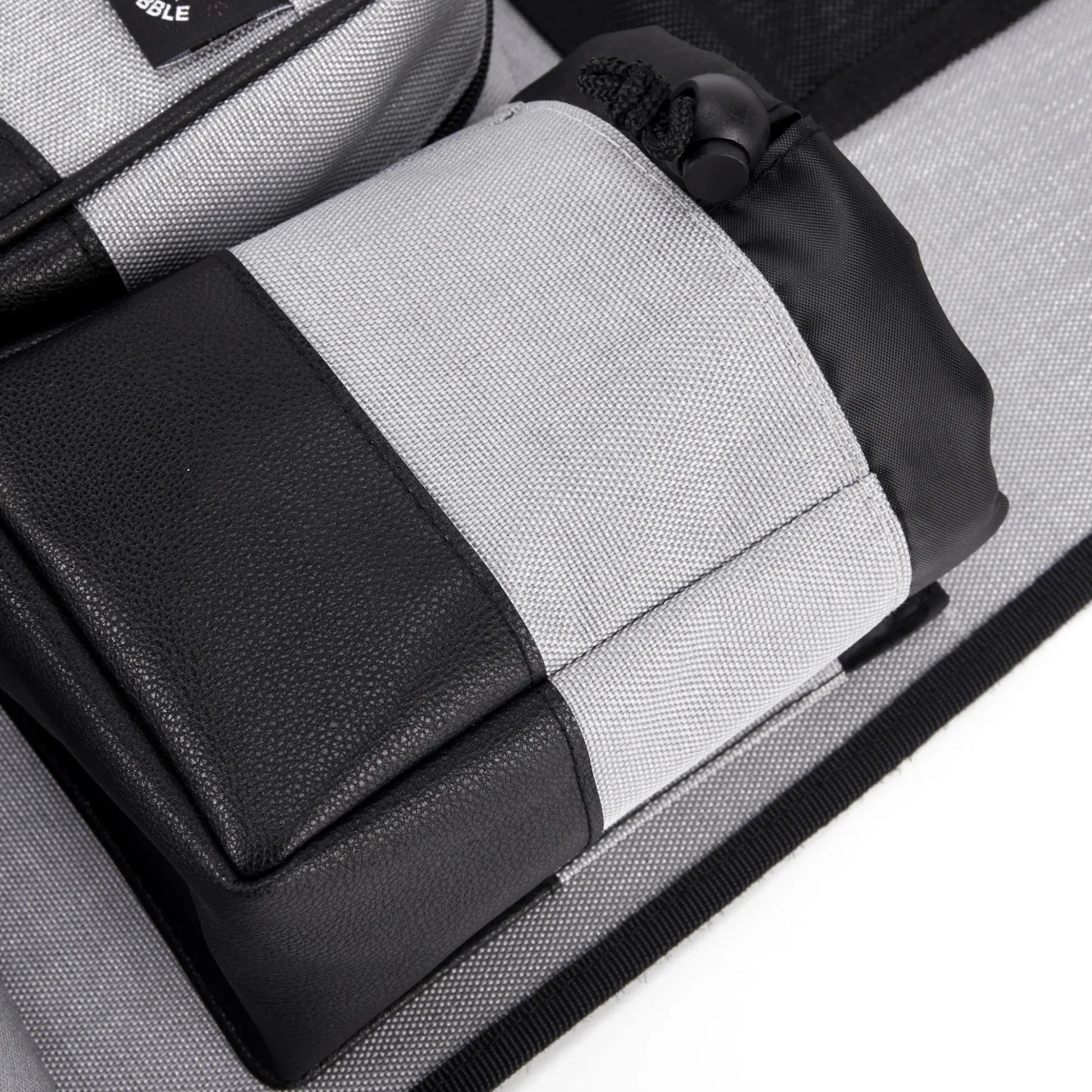 Gray and black textured seat cover.