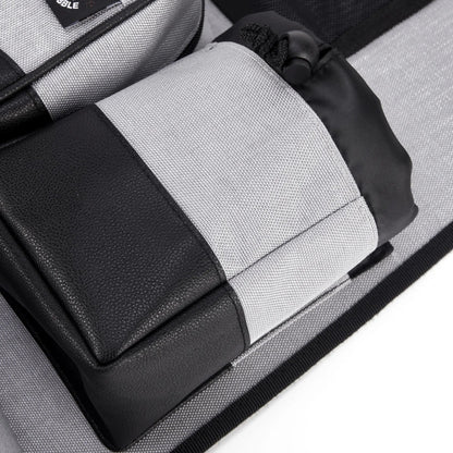 Gray and black textured seat cover.