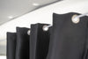 Black curtains with silver rings on a white background