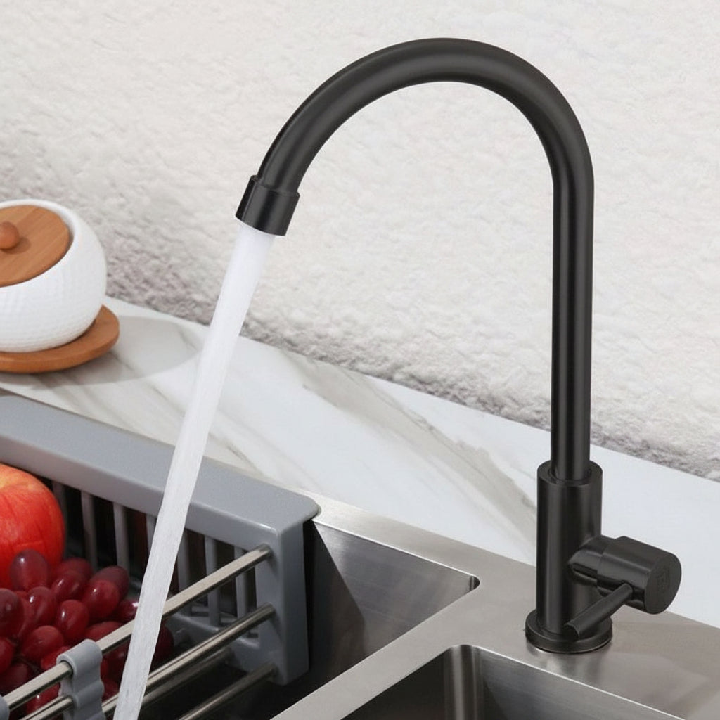 Matte black cold water faucet installed on campervan kitchen sink