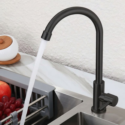 Matte black cold water faucet installed on campervan kitchen sink