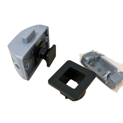 Grey and black flush-mounted push button cabinet latch with mounting hardware for RV, caravan, and marine applications