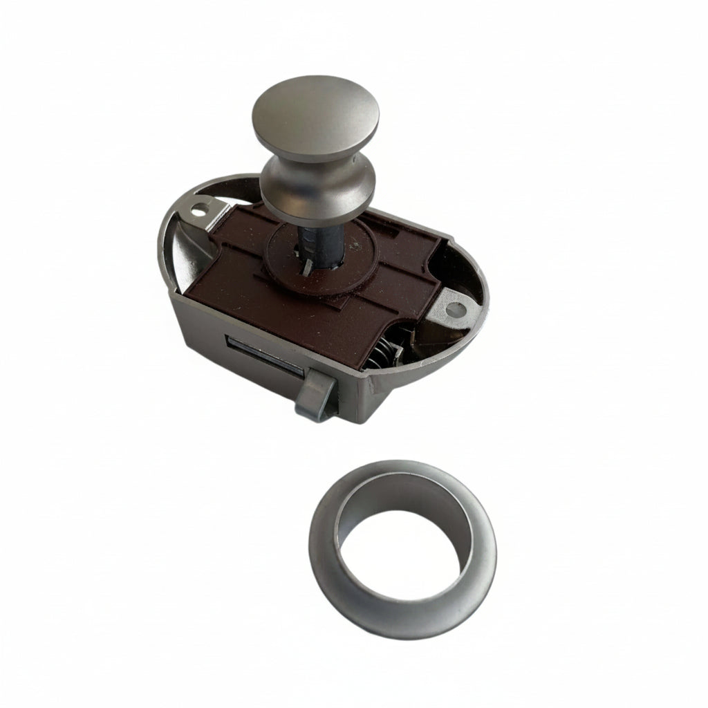 Front view of large nickel push button catch with mounting ring