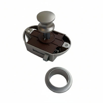 Front view of large nickel push button catch with mounting ring
