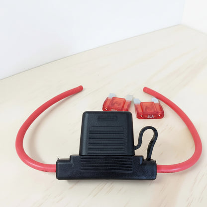 Installed Maxi Blade fuse holder with 8AWG cable in a 12V electrical setup