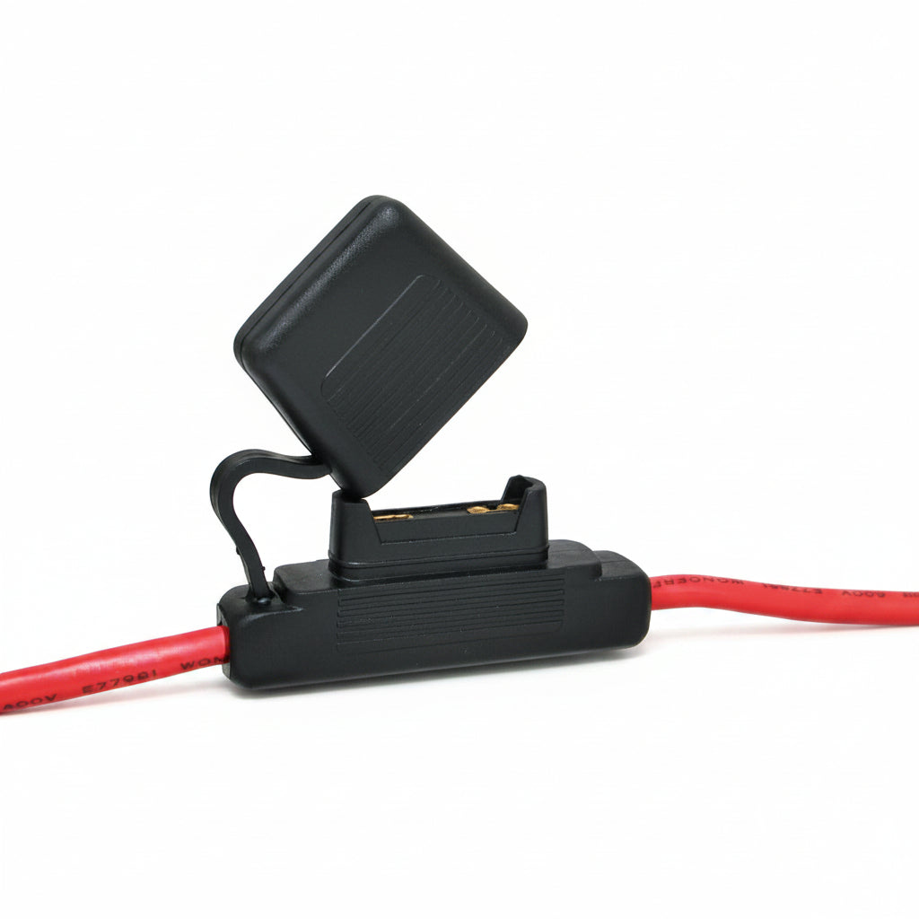 Open Maxi Blade fuse holder showing fuse compartment and protective cover