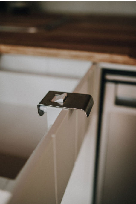 Stainless steel finger pull drawer latch van build cabinet