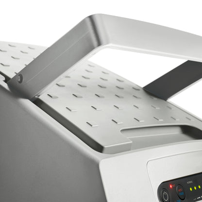 Close-up of the Dometic TCX 14 portable fridge lid with a sturdy handle and textured surface.