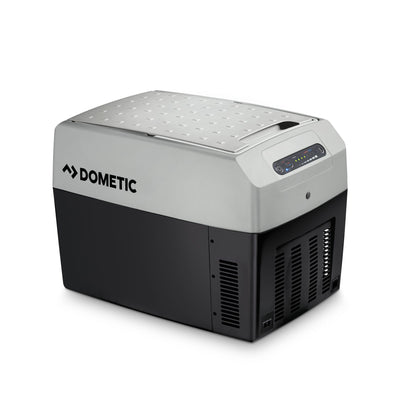 Dometic TCX 14 portable fridge with a silver top and black body, designed for compact spaces and efficient cooling.