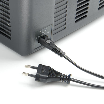 Close-up of the Dometic TCX 14 portable fridge power connection and plug, designed for efficient electric use.