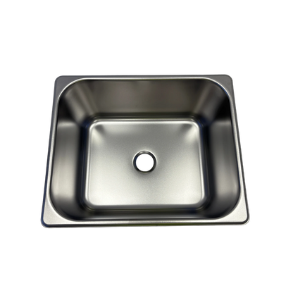 Stainless steel kitchen sink on a white background