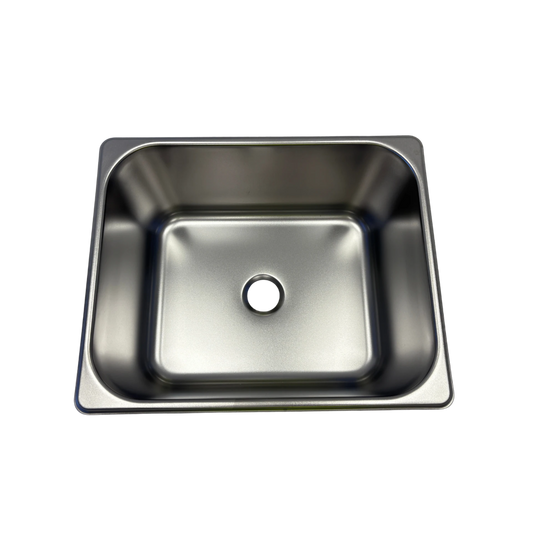 Stainless steel kitchen sink on a white background