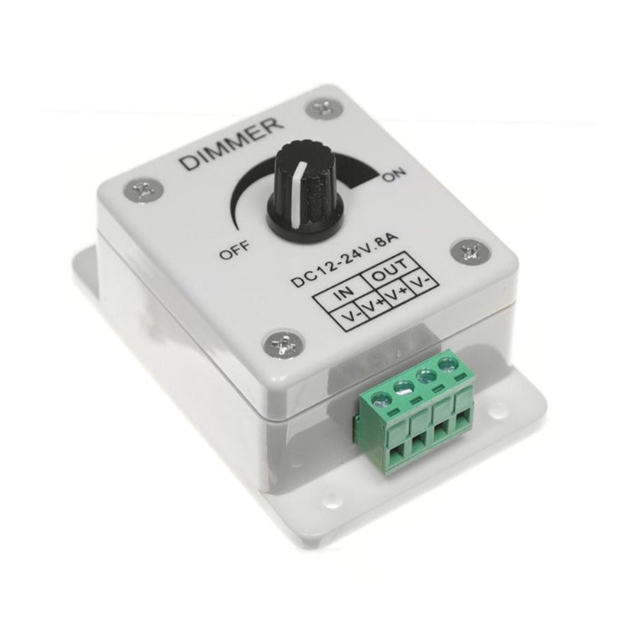 Dimmer switch with a rotary control on a white background