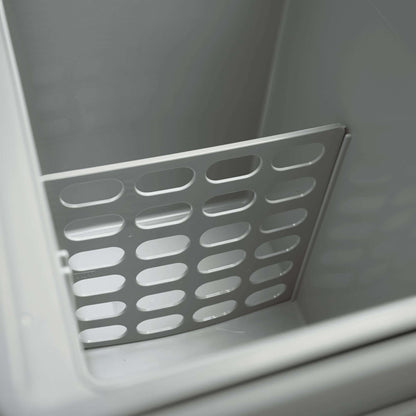 Interior of Dometic TCX 21 Portable Fridge showing the removable storage divider for efficient organization.